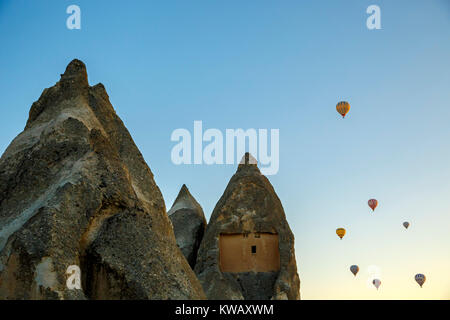 Fairy chimneys and hot air balloons, near Goreme, Cappadocia, Turkey Stock Photo