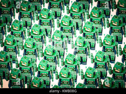 concept gong against the crowed with retro robot toys Stock Photo