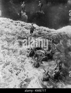 Overhead view of U.S. Marines taking the beach at Cape Gloucester, Papua New Guinea. Dec. 26, 1943. The invasion was part a Operation Cartwheel, aimed at neutralizing the major Japanese base at Rabaul, New Britain. World War 2. (BSLOC 2014 10 103) Stock Photo