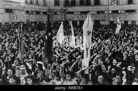 Chinese women cheering Madame Chiang Kai Shek's speech during Women's Day celebrations. Chongqing (Chungking), China, June 1942. Second Sino-Japanese War/World War 2. (BSLOC 2014 10 134) Stock Photo
