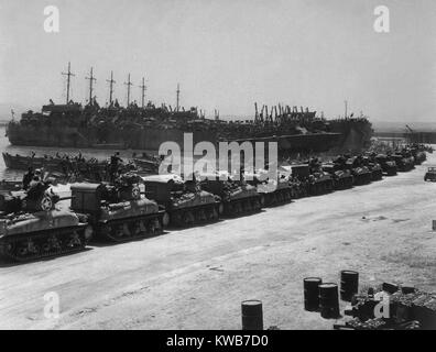 Two days before the Allied invasion of Sicily, tanks board landing craft. Ships are at the French Naval Base, La Pecherie, Tunisia. July 1943, World War 2. (BSLOC 2014 10 19) Stock Photo