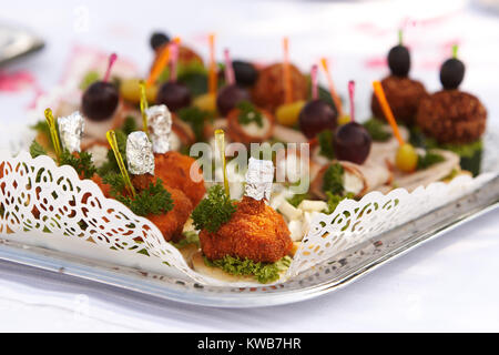 Meals on a white plates. Stock Photo