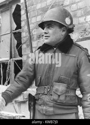 Brigadier General Anthony C. McAuliffe in Bastogne, Belgium. He gave the single-word reply of 'Nuts!' to a German surrender ultimatum. His judgment was sound, since the Nazis were short of supplies and Allied relief was on its way. Jan. 1945. World War 2. (BSLOC 2014 8 136) Stock Photo