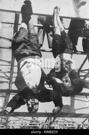 Executed Benito Mussolini and mistress, Clara Petacci, hanging by feet. Milan, Italy, May 1945. World War 2. (BSLOC 2014 10 54) Stock Photo