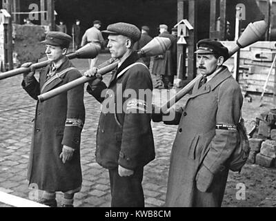 Some of the 60,000 Volksstrum engaged in the Battle of Berlin, April 16-May 2, 1945. These civilian members of the German militia are armed with anti-tank rocket-propelled grenades, 'Faustpatrone'. World War 2. (BSLOC 2014 8 73) Stock Photo