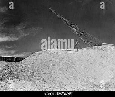 Nitrate mounds at Pedro de Valdivia, Chile in 1944. The whitish substance, caliche, was rich in sodium nitrate. Nitrates are the active ingredient of bombs and bullets. (BSLOC 2014 10 150) Stock Photo