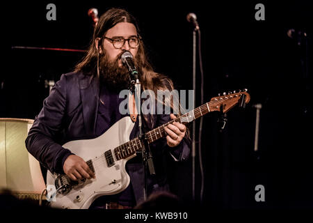 The two singers, musicians and songwriters, the Faroese Teitur and the American Matthew E. White (pictured) teamed up for a week making new songs and music under the concept “Suburban Summit” at Forbrændingen near Copenhagen. At the end of the process they performed the new songs at a live concert. Denmark, February 2016 Stock Photo