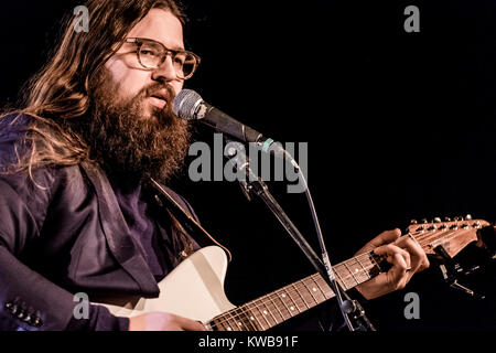 The two singers, musicians and songwriters, the Faroese Teitur and the American Matthew E. White (pictured) teamed up for a week making new songs and music under the concept “Suburban Summit” at Forbrændingen near Copenhagen. At the end of the process they performed the new songs at a live concert. Denmark, February 2016 Stock Photo