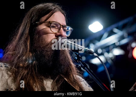 The two singers, musicians and songwriters, the Faroese Teitur and the American Matthew E. White (pictured) teamed up for a week making new songs and music under the concept “Suburban Summit” at Forbrændingen near Copenhagen. At the end of the process they performed the new songs at a live concert. Denmark, February 2016 Stock Photo