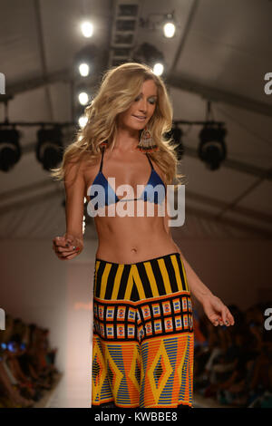 MIAMI BEACH, FL - JULY 21: A model walks the runway at the Indah fashion show during Mercedes-Benz Fashion Week Swim 2015 at The Raleigh on July 21, 2014 in Miami Beach, Florida.  People:  Model Stock Photo