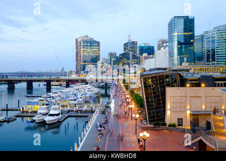 Cockle Bay Wharf Promenade in Darling Harbour (Harbor), Sydney, Australia, a very popular tourist attraction, waterfront cafes and restaurants Stock Photo