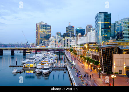 Cockle Bay Wharf Promenade in Darling Harbour (Harbor), Sydney, Australia, a very popular tourist attraction, waterfront cafes and restaurants Stock Photo