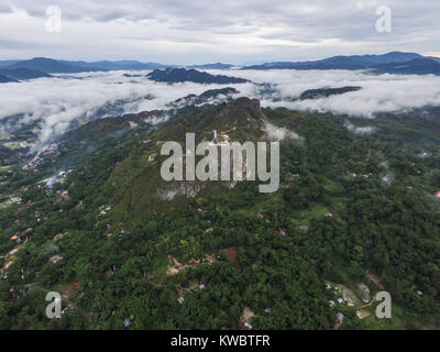 Cloud covering the city of Makale in Tana Toraja. It located 1.500 meters above sea level and most of the time cloud covering the city in the morning. Stock Photo