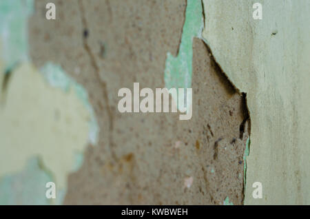 Wall with peeling paint, paint problem. Inadequate paint system, water infiltration. Stock Photo