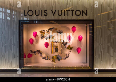 Louis Vuitton designer handbags and sunglasses for sale in shopping mall  Stock Photo - Alamy