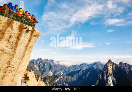 Mount Hua, Shaanxi Province, China - October 6, 2017: Tourists admire scenic view from Huashan mountain. Stock Photo