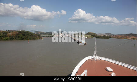 Bow of cruise ship sailing towards Miraflores lock, on the Panama Canal, Central America. Stock Photo