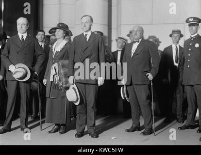 New President Calvin Coolidge and his wife Grace arrived in Washington DC on Aug. 3, 1923. They were welcomed by Secretary of State Charles Evens Hughes the day following the death of President Warren Harding. (BSLOC 2015 15 103) Stock Photo