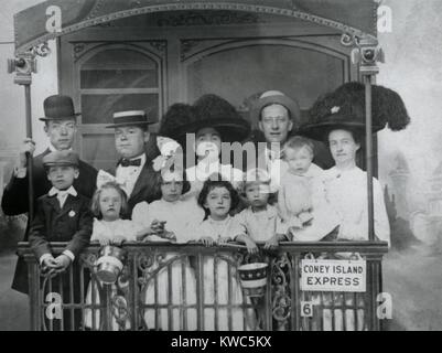 Alfred E. Smith and friends in a staged Studio Portrait, on 'The Coney Island Express.' Ca. 1910. Smith was then a member of the New York State Assembly, serving New York County's 2nd District from 1904 to 1915. (BSLOC 2015 15 203) Stock Photo