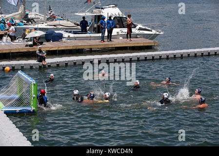 Water polo being played on Cape Town Harbour, Western Cape, South Africa, December 2017. Stock Photo