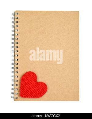 blank brown notebook with red heart on a white background Stock Photo
