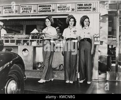 Drive-in restaurant in Hollywood, Los Angeles. June 29, 1938. The waitresses wear pseudo Highway Patrol Uniforms. The Fast Food menu includes: Hamburger and Cheese Combination; American and Swiss Cheese Melts, Grilled Bacon and Tomato on Toast; and Tuna Salad Sandwich. - (BSLOC 2014 17 115) Stock Photo