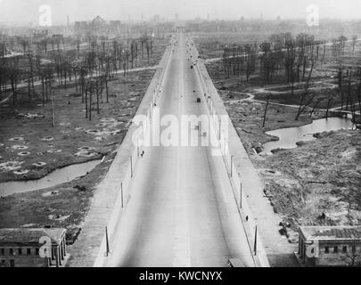 Tiergarten Park and the boulevard leading to the Brandenburg Gate after World War 2. The landscape is filled with bomb craters from the war. Berlin, Germany. Ca. 1945-46. - (BSLOC 2014 15 243) Stock Photo