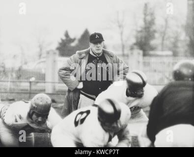 Football coach Earl 'Red' Blaik, oversees his players as they practice. Nov. 28, 1956. - (BSLOC 2015 1 111) Stock Photo