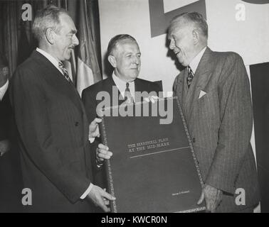 Celebration of the 2nd Anniversary of the Marshall Plan. Secretary of State Dean Acheson (left) and Economic Cooperation Administrator Paul Hoffman (center) present George Marshall a large bound report on operation of the Marshall Plan. April 3, 1950. - (BSLOC 2015 1 53) Stock Photo