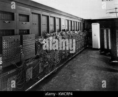 ENIAC computer was the first general-purpose electronic digital computer. 'Electronic Numerical Integrator And Computer' was 150 feet wide with 20 banks of flashing lights. Ca. 1946. - (BSLOC 2015 1 222) Stock Photo