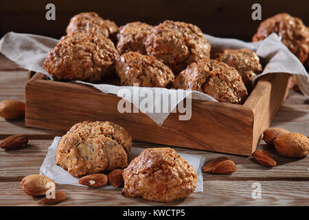 Shot of homemade almond cookies on rustic plate. Stock Photo