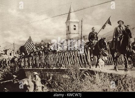 World War 1: Battle of St. Mihiel. Company of American Engineers, with colors flying, passing through the French town of Nonsard. Sept. 12-16, 1918. (BSLOC 2013 1 202)