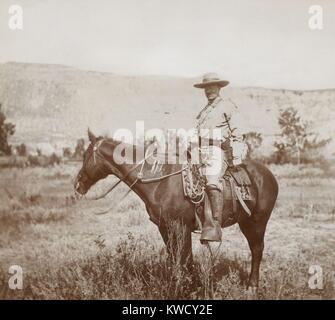 Young Theodore Roosevelt on his favorite hunting pony in the Badlands of North Dakota, 1885. He is wearing a ranch costume during a cattle roundup near Medora, North Dakota. Photo by Truman Ward Ingersoll (BSLOC 2017 4 91) Stock Photo