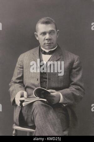 Booker T. Washington sits with books on his lap, c. 1903. His accommodationist philosophy of African American progressive was shaped by the violent racist oppression in the post-Civil War South  (BSLOC 2017 20 160) Stock Photo
