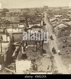 War-damaged Tianjin (Tientsin), China in July 1900 during the Box Rebellion. Its foreign quarter was besieged by the Boxers in June. On July 13-14, the eight nation allied force of 20,000 troops, took over Tianjin, as the first obstacle on their way the Beijing. Aggressive looting and massacre was committed by the Japanese and Russian soldiers, but soldiers of all nation took part  (BSLOC 2017 20 26) Stock Photo