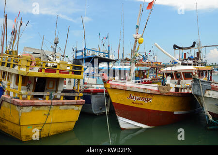 TANGALLE, SRI LANKA - 26 FEBRUARY 2015: Fishing cutters in the fishing harbour in Tangalle Stock Photo