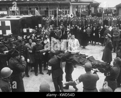 Chinese litter patients are carried from a C-54 in Taiwan following their flight from Korea. The former Chinese POWs chose not to return to mainland China. They were released through the U.N. Neutral Nations Repatriation Commission that held 'non-repatriates,' for 90 days to consider their choice of nationality. Jan. 1954. (BSLOC 2014 11 185) Stock Photo