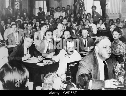Whittaker Chambers before the House Un-American Activities Committee, Aug. 25, 1948. He repeated his testimony that State Department Director, Alger Hiss, was a secret communist. Hiss is in mid-ground left, looking into camera. (BSLOC 2014 13 57) Stock Photo