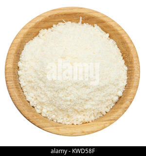 grated Parmesan cheese in wooden bowl on white background Stock Photo