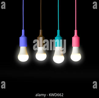 a shot of four light bulbs in four different coloured pendant holders against a black background Stock Photo