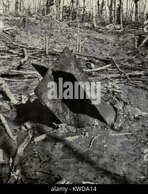 World War 1. With its tail-fins showing, an unexploded air torpedo is half buried in the ground. Duds contributed to the ineffective British shelling during the early weeks of to the Battle of the Somme. 1916. (BSLOC 2013 1 120) Stock Photo