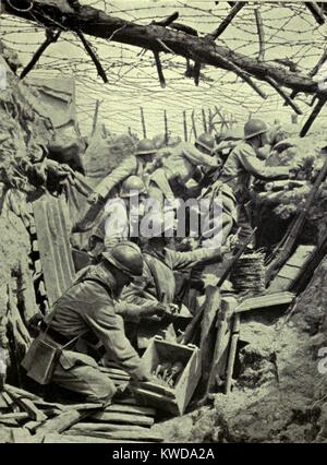 World War 1. Somme Offensive. These French soldiers were bombing (throwing hand grenades) at the German trenches near Maurepas from a range of fifteen yards. They would follow with a bayonet charge to take the German position in hand to hand combat. August 1916. (BSLOC 2013 1 132) Stock Photo