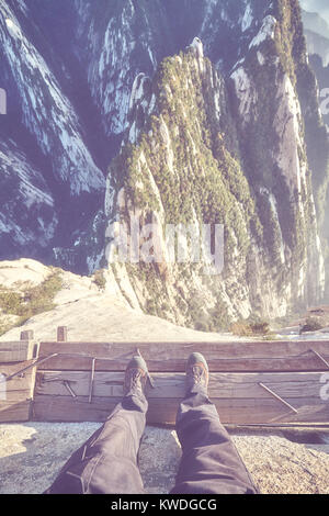 Plank Road in the Sky at Mount Hua, worlds most dangerous hike, color toned picture, China. Stock Photo