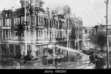 Fire engine spraying water on burned buildings in San Francisco after the 1906 earthquake (BSLOC 2017 17 12) Stock Photo