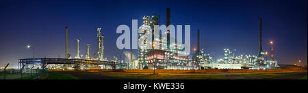 A gigantic oil refinery in the harbor of Antwerp at night. Stock Photo