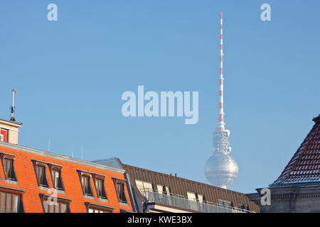 Berlin TV Tower at Alexanderplatz seen from Gendarmenmarkt on a hazy day. Stock Photo