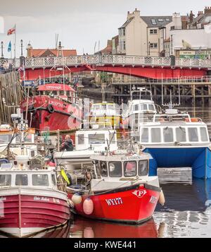 Whitby harbour with boats and bridge Stock Photo