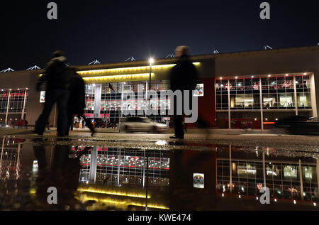 Cars and fans pass St Mary's Stadium ahead of the Premier League match between Southampton and Crystal Palace. Stock Photo