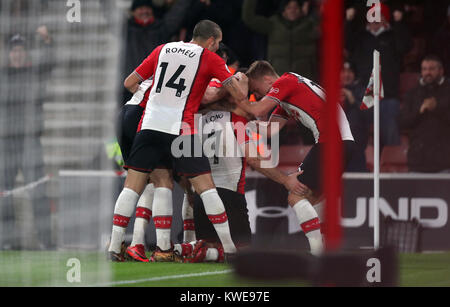 Southampton's Shane Long (centre) celebrates scoring his side's first goal of the game with team-mates during the Premier League match at St Mary's Stadium, Southampton. Stock Photo