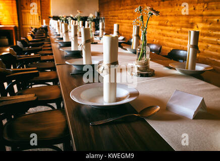 Dining table decorated with wedding decoration on the table Stock Photo